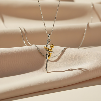 Ambre™ | Collar Abrazo de Mamá